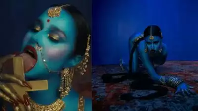 കുരിശ് നാവിൽ വച്ച് കാളി ദേവിയുടെ വേഷം ധരിച്ച് റാപ്പർ, വിവാദത്തിൽപെട്ട  ഇന്ത്യൻ വംശജ; ആരാണ് ടോമി ജെനസിസ്?