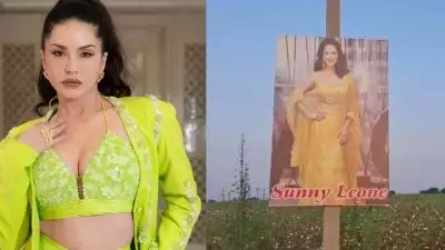 കണ്ണേറ് തട്ടരുത്.. പാടത്ത് കരിങ്കോലത്തിന് പകരം 'സണ്ണി ലിയോണ്‍'; അപമാനിച്ചുവെന്ന് വിമര്‍ശനം